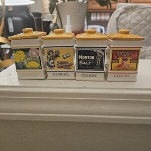 NEARLY VINTAGE SET OF PORCELAIN SPICE JARS.